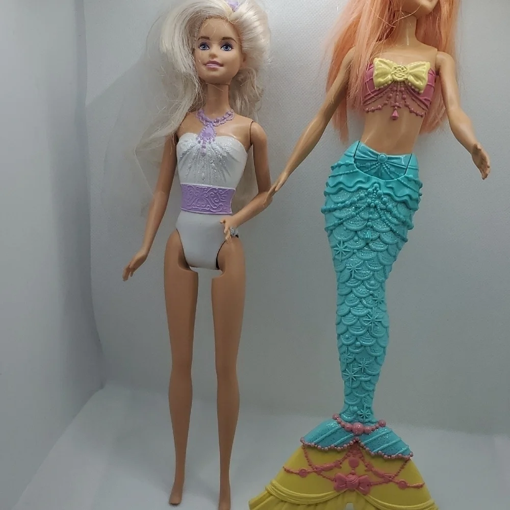 Mattel Dolls with Blonde Hair and Colorful Outfits